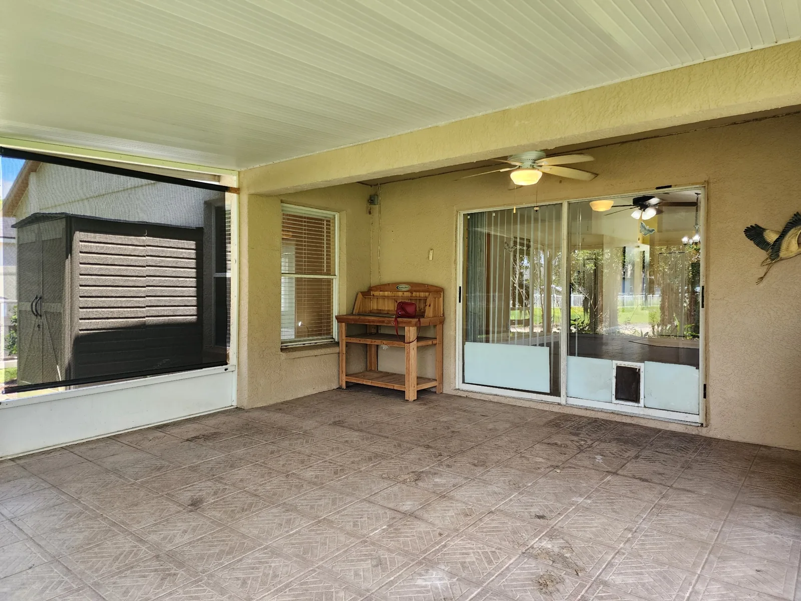 Screened porch at 30702 Iverson Drive, Wesley Chapel, FL 33543